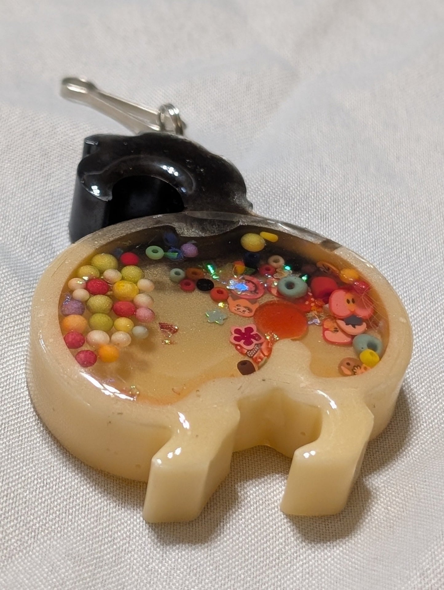 Black and white dog butt keychain shaker