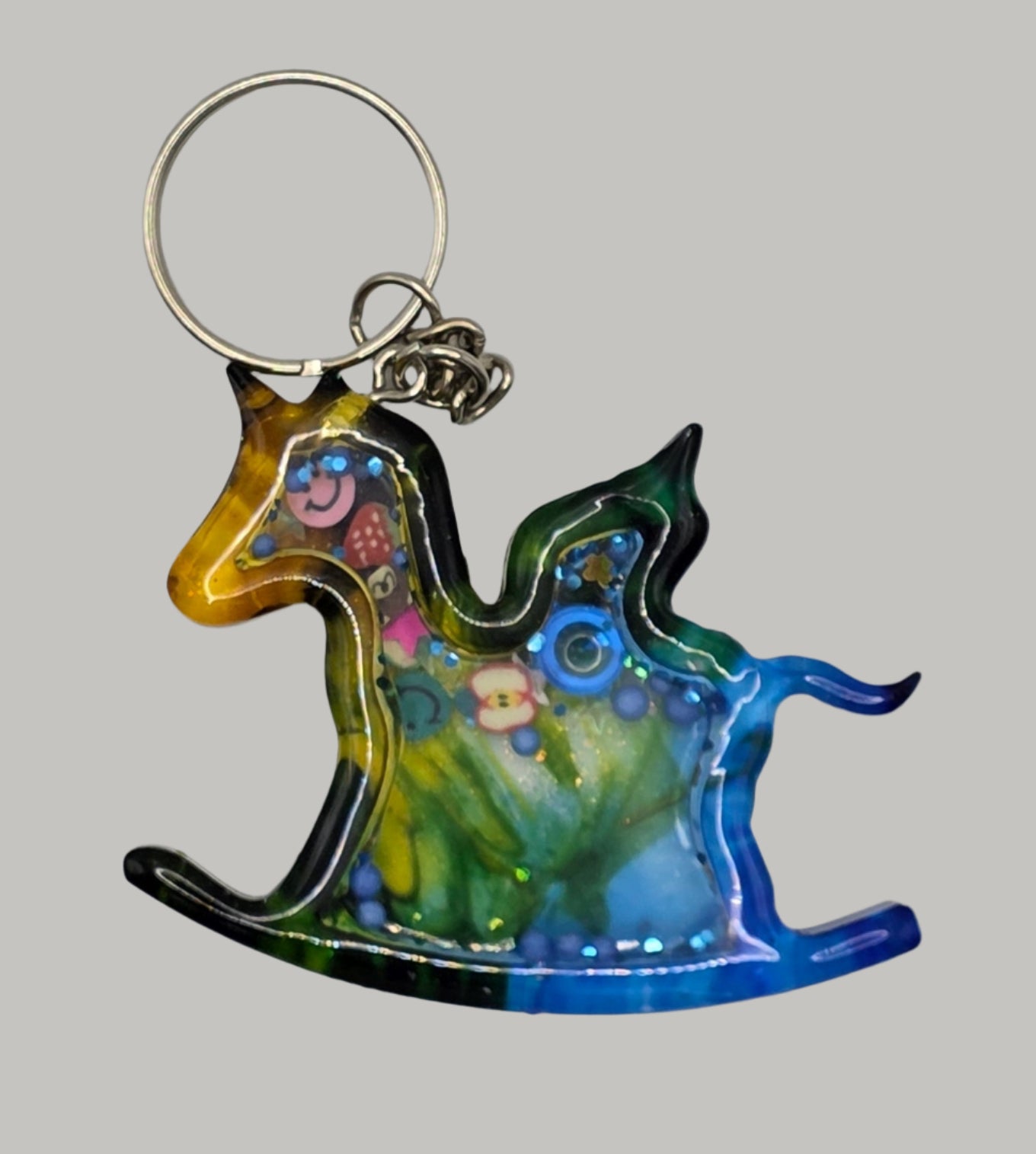 Rocking_horse_shaker_keychain blue yellow front