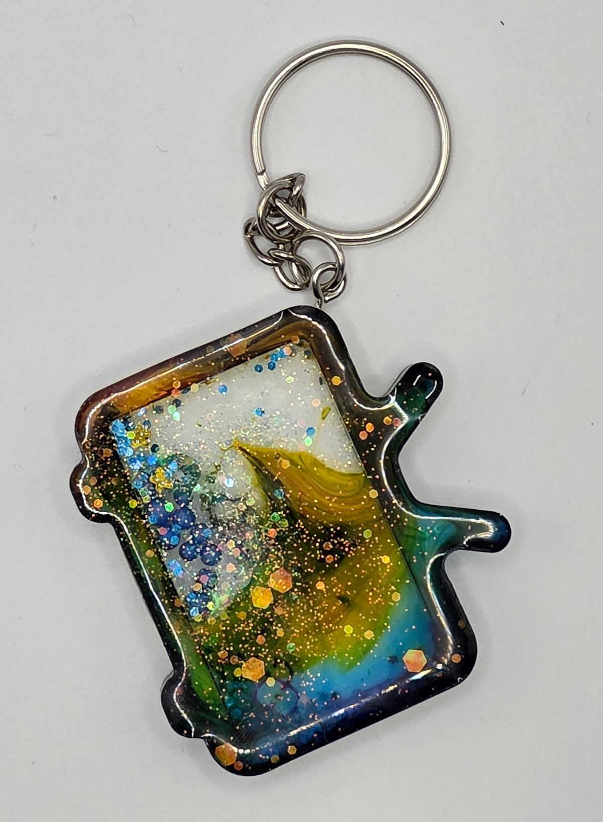 blue yellow tv shaker keychain back
