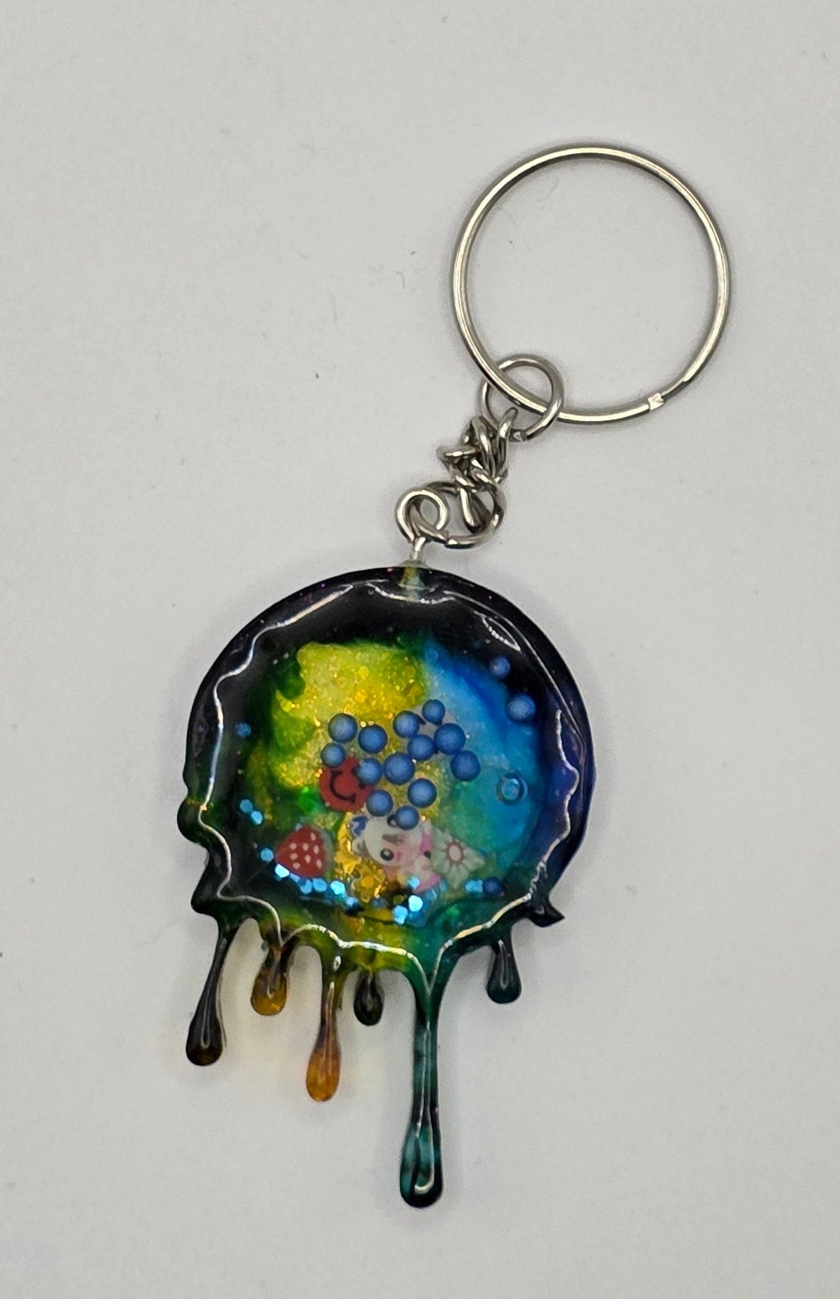 melting circle shaker keychain front