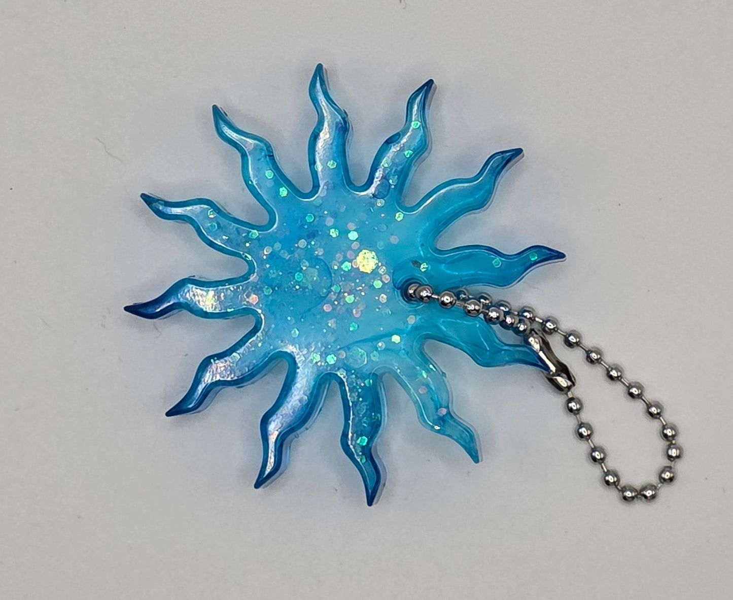 blue sun sparkle keychain