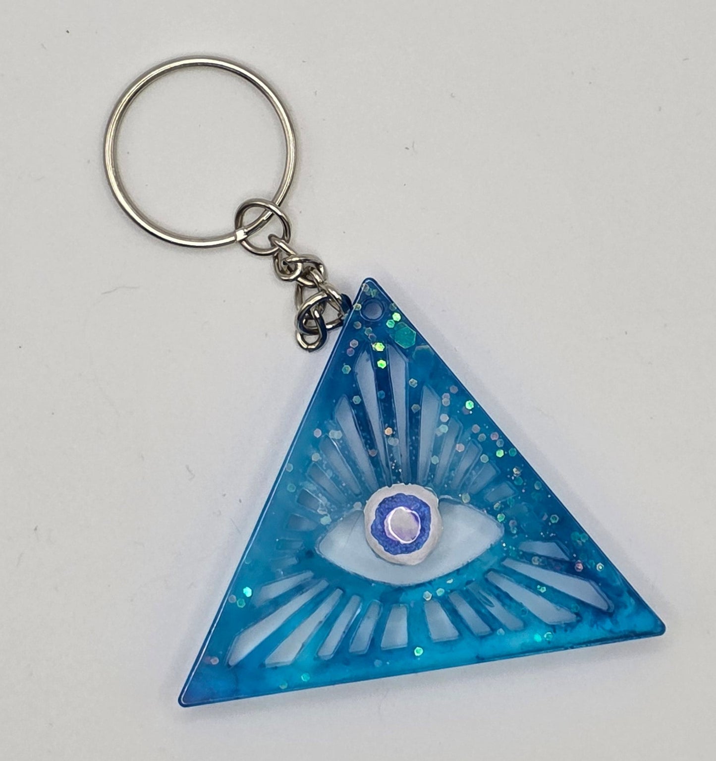 blue triangle evil eye keychain