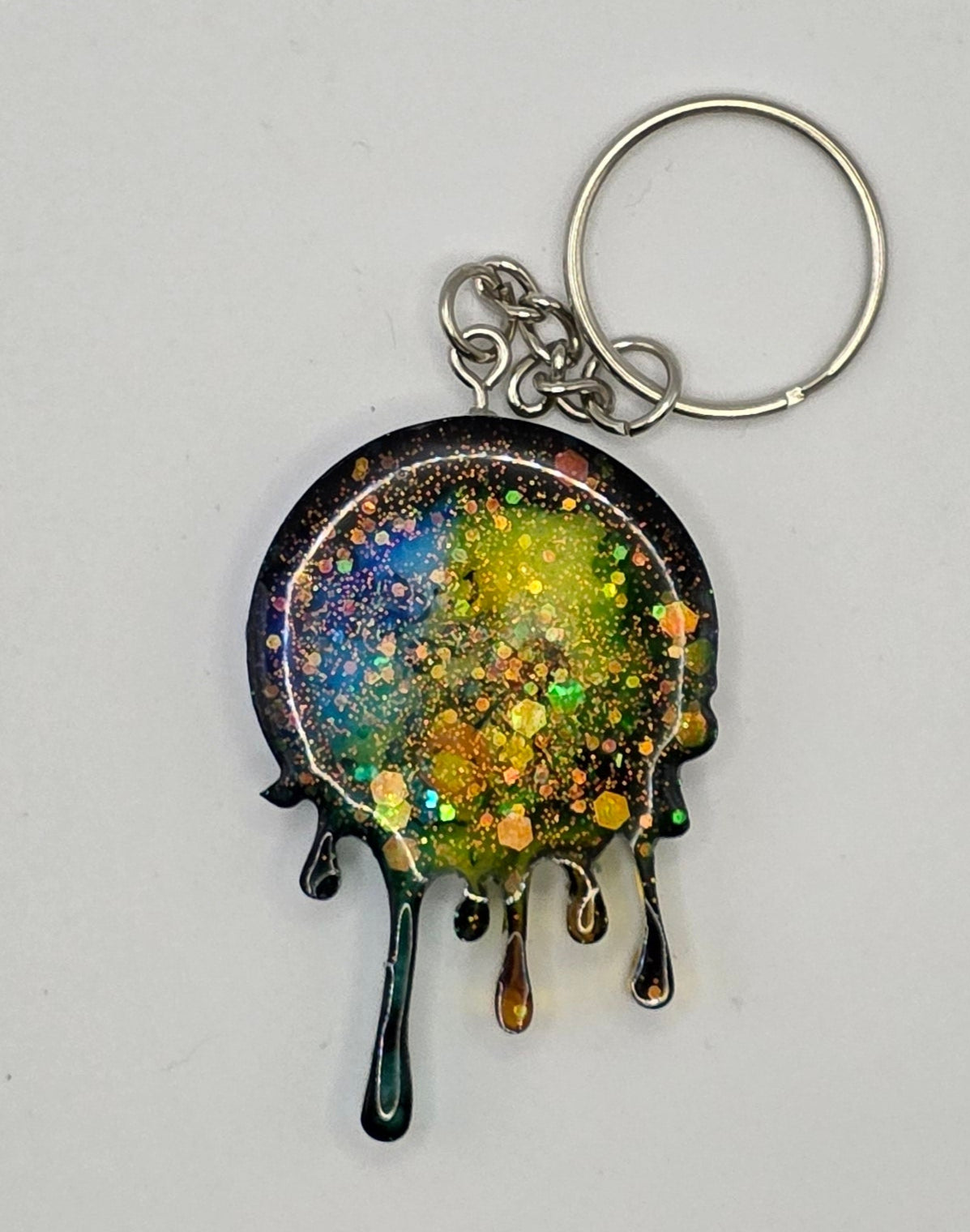 blue yellow circle dripping shaker keychain back