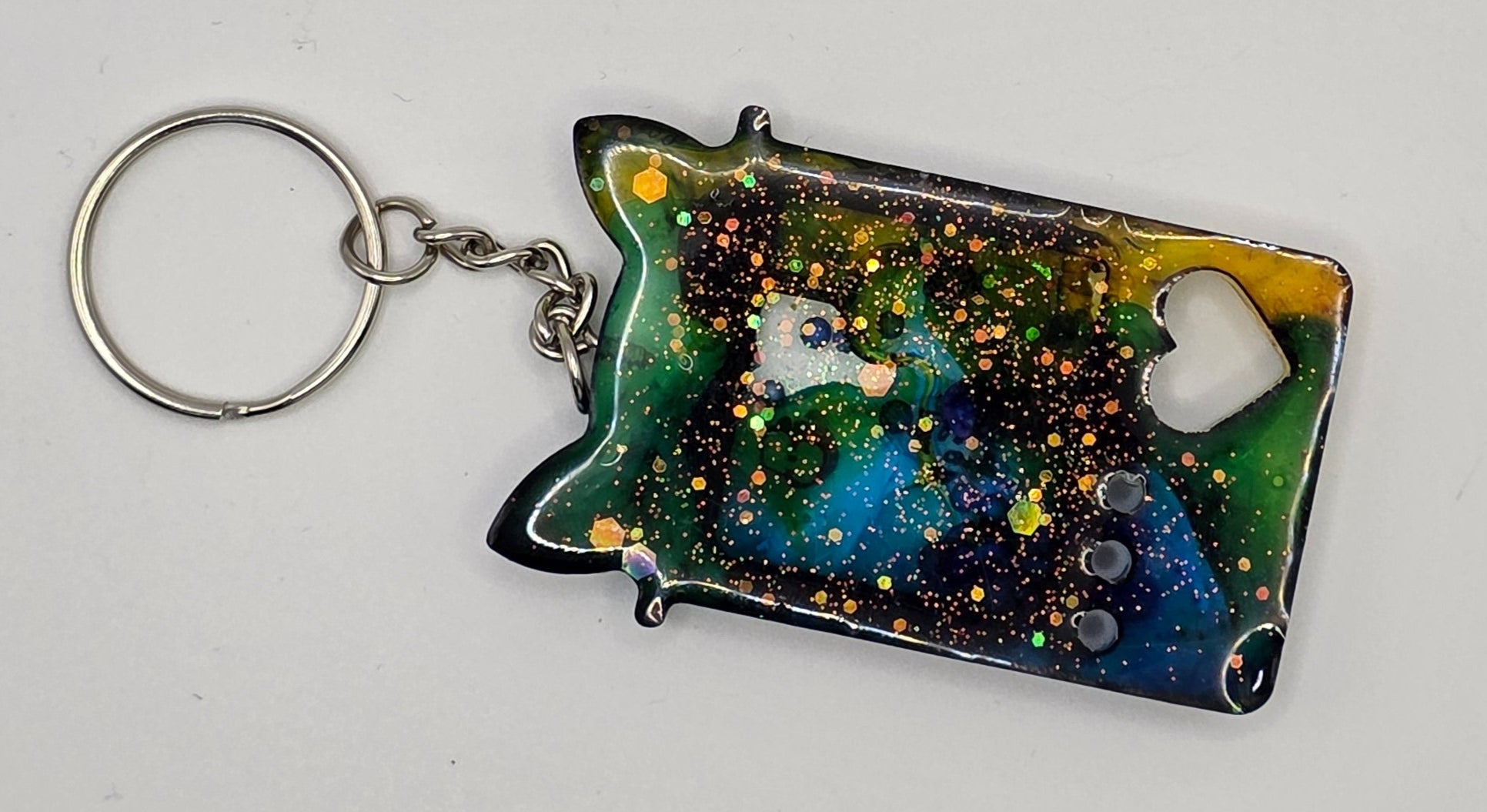 blue yellow claw game shaker keychain back