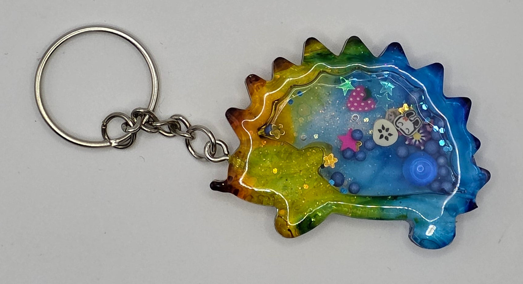 hedghog_shaker_keychain blue yellow front