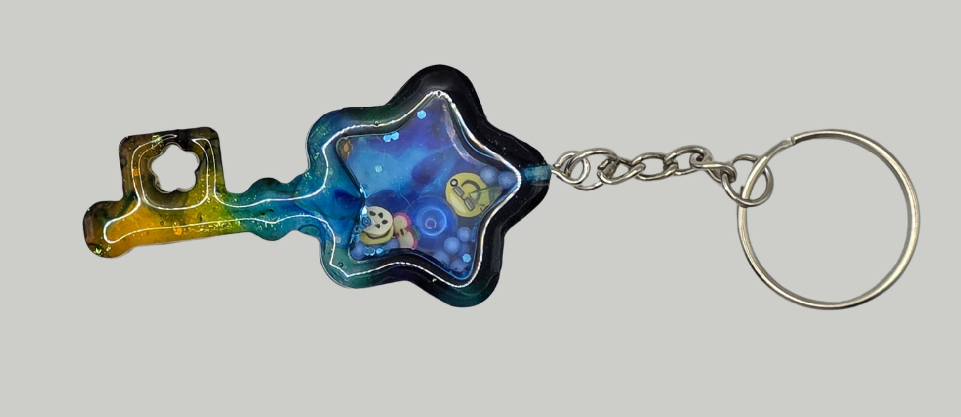 key shaker keychain yellow blue front